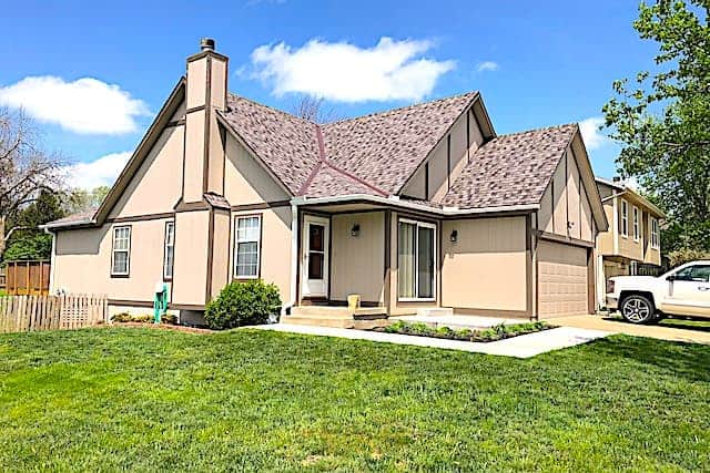 Above All Construction displays a picture of one of their recent jobs as a roofing contractor for a local Kansas City metro home owner.