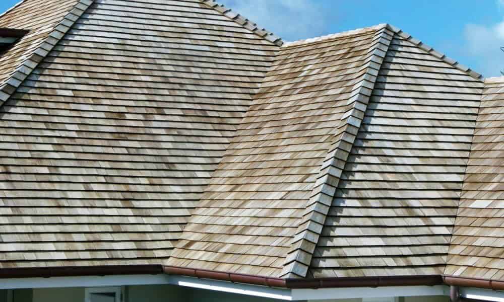 Above All Construction displays a commercial cedar shingle roof.