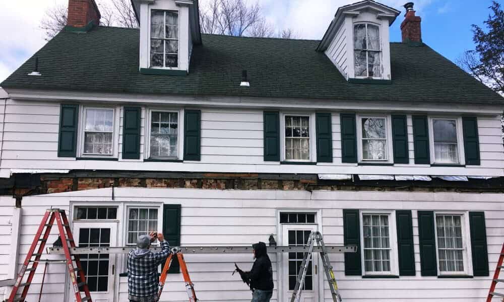 Above All Construction displays an example of a historic roof restoration.