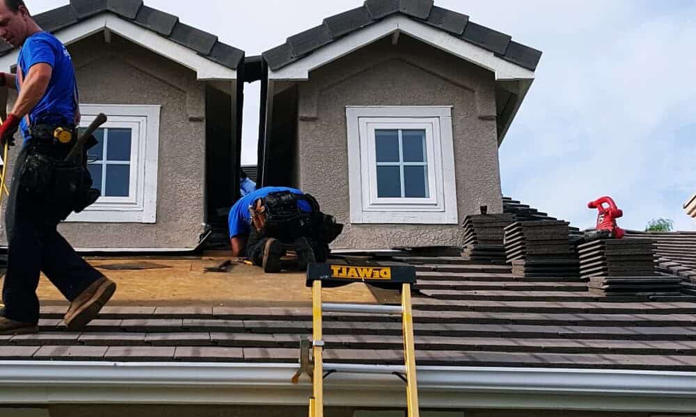 Above All Construction displays an example of a residential roof repair.