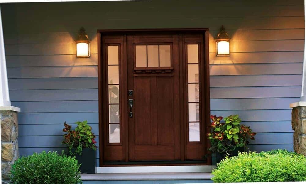 Above All Construction displays a home with a new front entry door that they recently installed.