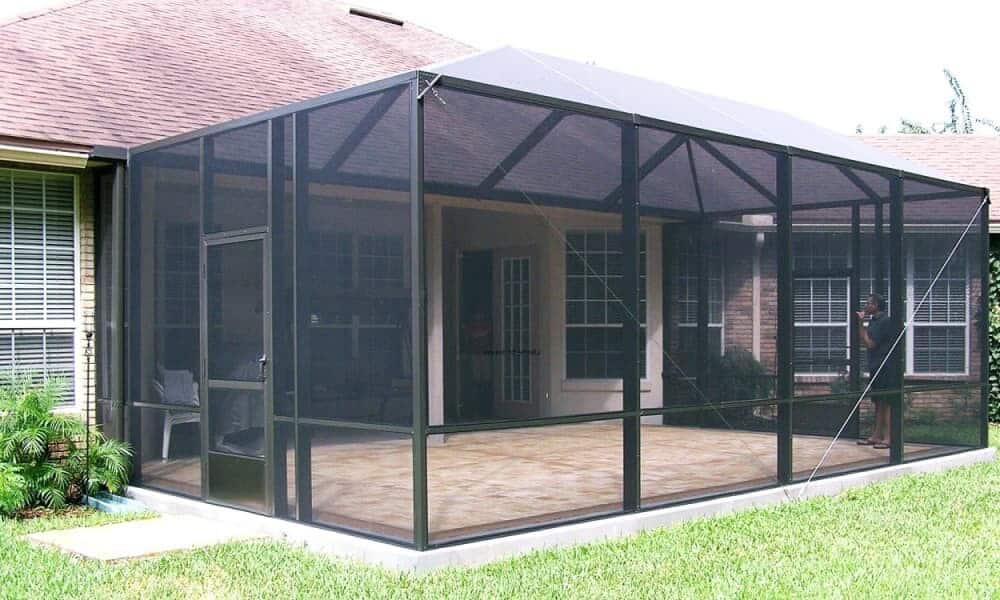 Above All Construction displays a home with a new patio enclosure that they recently installed.