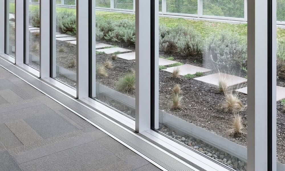 Above All Construction displays a business with new commercial windows that they recently installed.